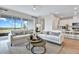 Open-concept living room with views and stylish decor at 9253 Players Dr, Weeki Wachee, FL 34613