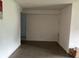 Empty living room with neutral walls and flooring, offering a blank canvas for customization at 1009 Kenmore Dr, Brandon, FL 33510