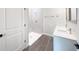 The bathroom features a walk in shower, double sinks and modern fixtures at 17381 Tyler Ave, Port Charlotte, FL 33948