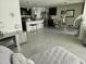 Open concept living area flows into the kitchen, ideal for entertaining and Gathering gatherings at 6315 Hillview Rd, Spring Hill, FL 34606