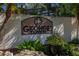 A 'George Town' sign surrounded by well-manicured landscaping and palm trees at 1103 Kensington Ct, Safety Harbor, FL 34695