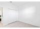 Bright bedroom with neutral walls, floors and closet, creating a serene and calming atmosphere at 11330 Burgundy Dr, Venice, FL 34293