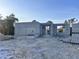 View of new construction with gray concrete walls, showcasing potential for a modern, custom-built home at 122 Naomi Pl, Rotonda West, FL 33947