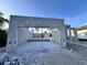 The image shows a garage with a concrete structure, waiting to be transformed into a personalized space at 122 Naomi Pl, Rotonda West, FL 33947