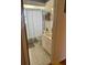 Small bathroom featuring a shower with a curtain at 12322 Alta Mira St, North Port, FL 34287