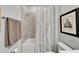 Clean bathroom featuring a shower-tub combination with tiled walls and a patterned shower curtain at 19165 Iron Topsail Isle, Land O Lakes, FL 34638