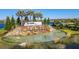 Scenic community entrance with waterfall feature, lush landscaping, and Del Webb sign at 19165 Iron Topsail Isle, Land O Lakes, FL 34638