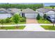 Inviting single-Gathering home with well-maintained landscaping and a brick driveway at 19165 Iron Topsail Isle, Land O Lakes, FL 34638