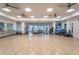 Large fitness center with wall mirrors, ballet bar and rack for various fitness equipments at 19165 Iron Topsail Isle, Land O Lakes, FL 34638