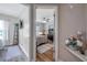 View of bedroom featuring ceiling fan, wood floors, and natural light through windows with blinds at 2601 Upton S St, Gulfport, FL 33711