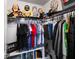 This well-organized closet has lots of hanging space, as well as room for toys and shoes at 5367 Riverwalk Preserve Dr, New Port Richey, FL 34653