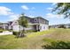 Well-maintained two-story townhome boasting an attached two-car garage and beautifully landscaped front yard at 5367 Riverwalk Preserve Dr, New Port Richey, FL 34653