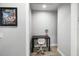Cozy bonus room, study or office space with wood-look flooring, a desk, and ample natural light at 5367 Riverwalk Preserve Dr, New Port Richey, FL 34653