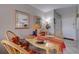 Cozy dining area with natural light and colorful decor at 10365 Paradise Blvd # 21, Treasure Island, FL 33706