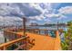 Water view of community dock with boat parking at 10365 Paradise Blvd # 21, Treasure Island, FL 33706