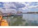 Picturesque waterfront view with boats docked, showcasing waterfront living and boating lifestyle at 10365 Paradise Blvd # 21, Treasure Island, FL 33706