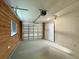 Spacious garage with a side-entry door and ample storage space for vehicles and equipment at 4546 Ontario Dr, New Port Richey, FL 34652