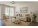 Inviting living room with neutral tones, modern lighting, and a comfortable sofa at 4546 Ontario Dr, New Port Richey, FL 34652