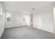 Bright, spacious bedroom with neutral tones and large windows that fills the room with natural light at 9127 Players Dr, Weeki Wachee, FL 34613