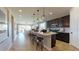 Spacious kitchen with an island flows into the dining and living areas, great for entertaining at 9127 Players Dr, Weeki Wachee, FL 34613