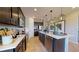 Well-equipped kitchen with stainless steel appliances and a large island with seating at 9127 Players Dr, Weeki Wachee, FL 34613