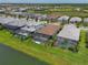 Lovely community with lush greenery, featuring screened pools perfect for enjoying the outdoors at 14553 Eagle Branch Dr, Nokomis, FL 34275