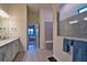 Stylish bathroom with a large tiled shower and an ensuite view to the main bedroom at 14553 Eagle Branch Dr, Nokomis, FL 34275