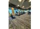 Well-equipped gym with treadmills and other fitness equipment with multiple windows at 14553 Eagle Branch Dr, Nokomis, FL 34275