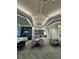 Relax in the modern lounge area with comfortable seating and stylish decor at 14553 Eagle Branch Dr, Nokomis, FL 34275