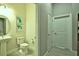 Bright powder room featuring a pedestal sink, modern fixtures, and neutral paint at 14553 Eagle Branch Dr, Nokomis, FL 34275