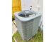 Exterior view of central air conditioning unit at 801 Leeward Way, Palm Harbor, FL 34685