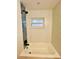 Bathroom with shower and tub combination, and mosaic tile wall at 801 Leeward Way, Palm Harbor, FL 34685