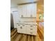 Kitchen features white cabinets and light granite counters at 801 Leeward Way, Palm Harbor, FL 34685
