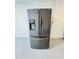 Stainless steel Samsung refrigerator with filtered water and ice dispenser at 801 Leeward Way, Palm Harbor, FL 34685