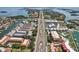 High definition aerial view of waterfront property near bay with a clear blue sky at 1061 Pinellas Bayway S, Tierra Verde, FL 33715