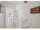 Hallway leading to living room area at 1061 Pinellas Bayway S, Tierra Verde, FL 33715