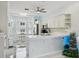 Modern kitchen featuring white cabinets, stainless steel appliances, and breakfast nook at 1061 Pinellas Bayway S, Tierra Verde, FL 33715
