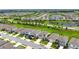 Aerial view showcasing the landscaped community featuring ponds, lush lawns, and well-maintained surroundings at 3255 Hilltop Cir, Bradenton, FL 34211