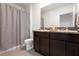 Functional bathroom with double vanity and a shower tub combination at 3255 Hilltop Cir, Bradenton, FL 34211