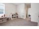 Bright room showcasing neutral walls and plush carpeting and storage at 3255 Hilltop Cir, Bradenton, FL 34211