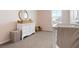Bright Bedroom with carpeting, white dresser and modern crib at 3255 Hilltop Cir, Bradenton, FL 34211