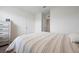 Bright bedroom with plenty of natural light, neutral walls, carpet, and a comfortable bed at 3255 Hilltop Cir, Bradenton, FL 34211