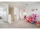 Bright hallway featuring neutral walls and plush carpeting, perfect for comfortable living at 3255 Hilltop Cir, Bradenton, FL 34211