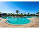 Outdoor swimming pool featuring lounge chairs and lush landscaping at 3255 Hilltop Cir, Bradenton, FL 34211