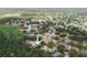 Aerial view of neighborhood with tree-lined streets and well-maintained homes at 4428 Winding River Drive, Valrico, FL 33596