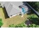 Backyard view with a screened-in pool and an outdoor patio area at 4428 Winding River Drive, Valrico, FL 33596