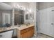 Bathroom featuring a vanity with great lighting, a mirror, a toilet, and shower with curtain at 4428 Winding River Drive, Valrico, FL 33596