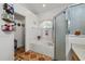 Bright bathroom featuring a soaking tub and walk in shower at 4428 Winding River Drive, Valrico, FL 33596