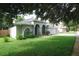 Charming single-Gathering home with a well-manicured lawn and lovely landscaping at 4428 Winding River Drive, Valrico, FL 33596
