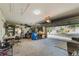 Spacious two-car garage with ample storage space and open door to the home's exterior at 4428 Winding River Drive, Valrico, FL 33596